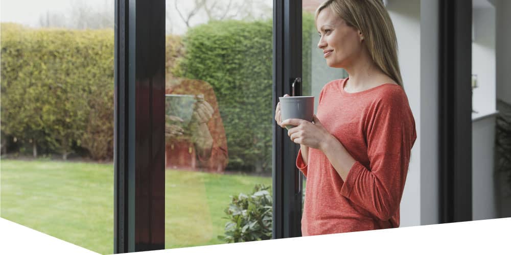Woman looking out at garden
