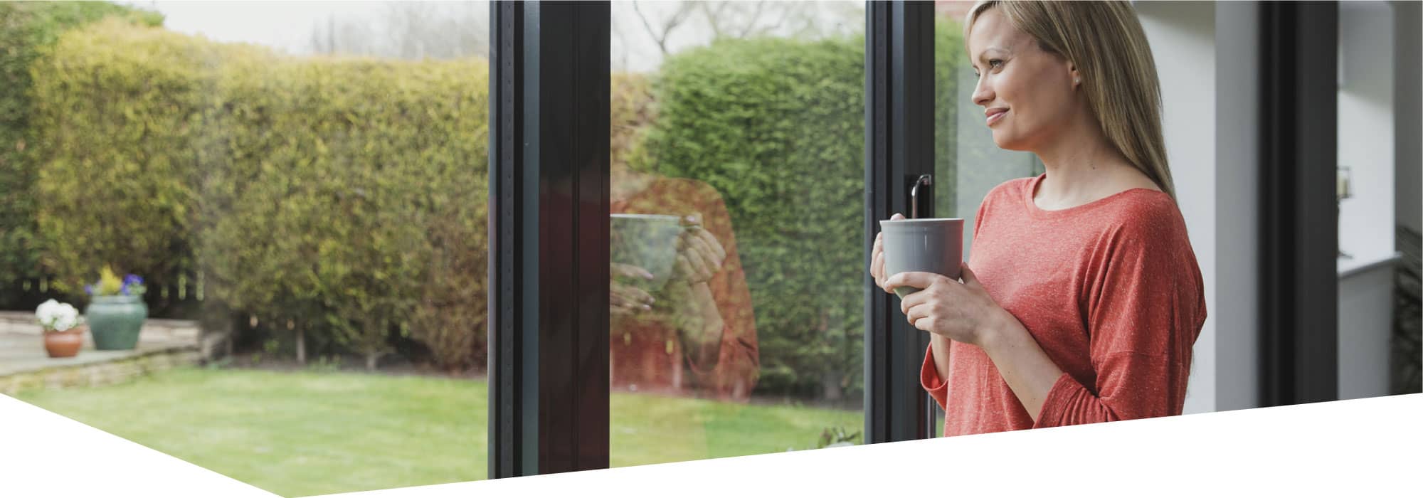 Woman looking out at garden