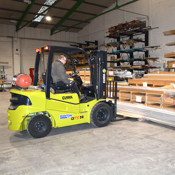 Forklift truck in warehouse